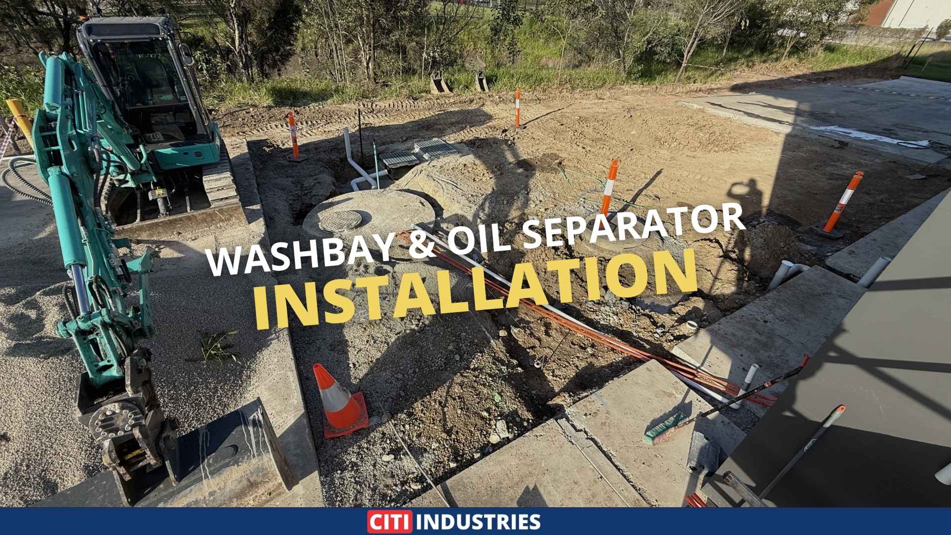 Washbay drainage system installation underway at an industrial vehicle maintenance facility in Carole Park Queensland, showing excavation and groundworks for collection pit and holding tank.